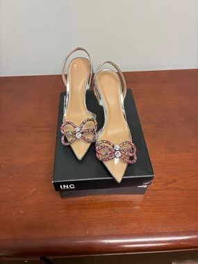 Multi color clear shoes INC